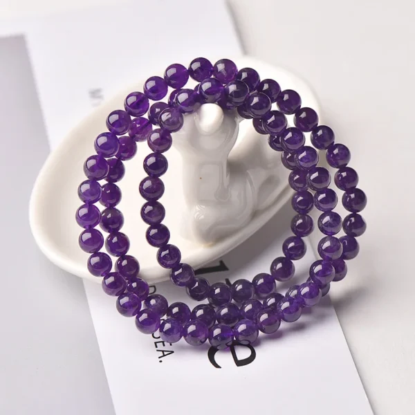 Amethyst bead arrangement on the three-wrap amethyst bead bracelet Three Wrap Amethyst Bracelet from Another Angle