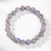 Gray moonstone bracelet with 7-8mm round beads on a white surface