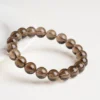 Angled view of a smoky brown quartz bead bracelet