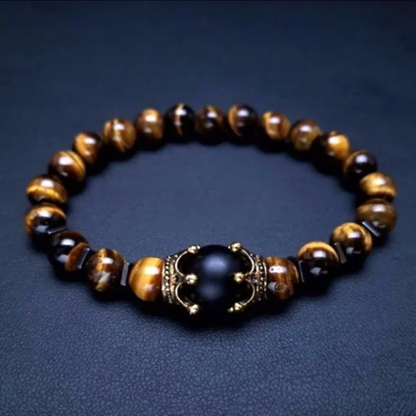 Tiger Eye and amethyst bead bracelet on dark background