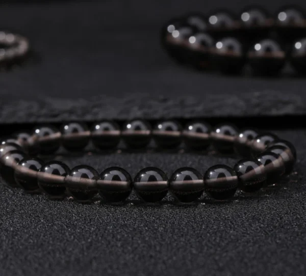 Tea Obsidian Bracelet Close Up 8mm tea obsidian bracelet close-up